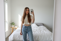 a generic white girl mirror selfie